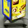 Hbe0310553747438cb1b7545ee451ce1fz.jpg_960x960q80.jpg Customizable Rotating Four Sided Soft Film Custom Sign